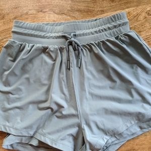 Small blue/green gymshark shorts